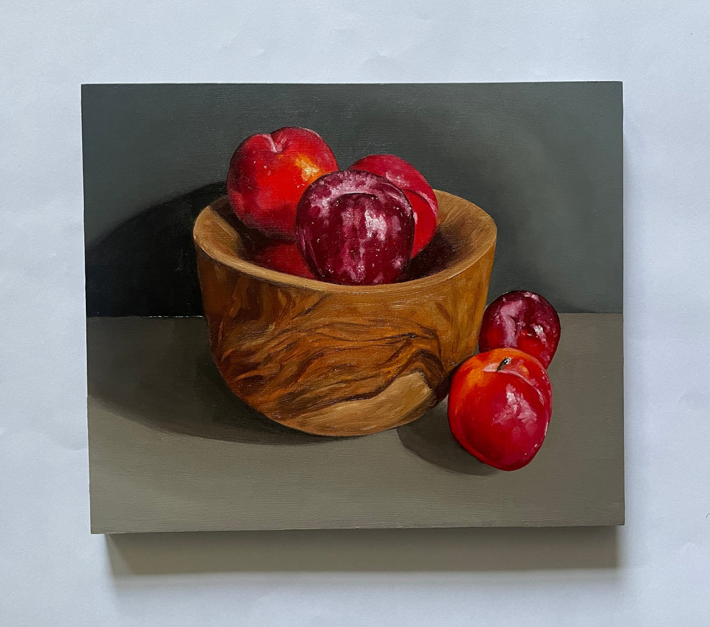 Plums in Wooden Bowl